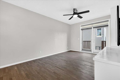 77 Kinlea Way Nw, Calgary, AB - Indoor Photo Showing Other Room