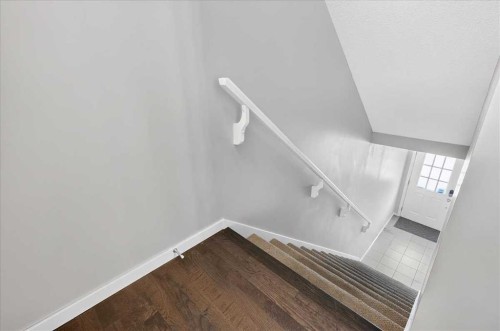 77 Kinlea Way Nw, Calgary, AB - Indoor Photo Showing Other Room