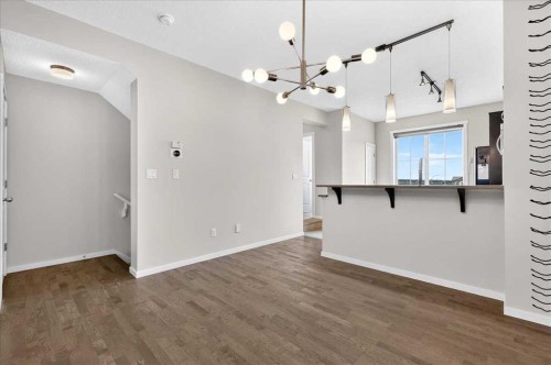 77 Kinlea Way Nw, Calgary, AB - Indoor Photo Showing Other Room