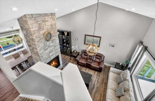 76-16044 258 Avenue East, Rural Foothills County, AB - Indoor With Fireplace