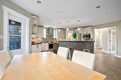 105 Lang Place, Okotoks, AB - Indoor Photo Showing Dining Room