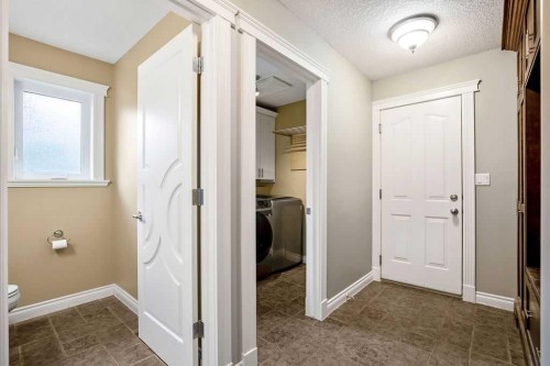 105 Lang Place, Okotoks, AB - Indoor Photo Showing Other Room