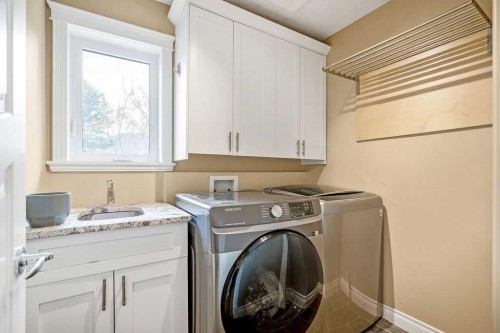 105 Lang Place, Okotoks, AB - Indoor Photo Showing Laundry Room