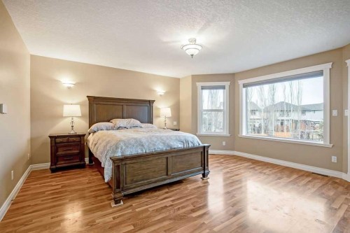 105 Lang Place, Okotoks, AB - Indoor Photo Showing Bedroom