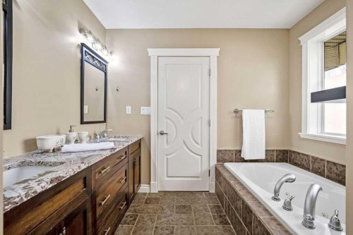 105 Lang Place, Okotoks, AB - Indoor Photo Showing Bathroom