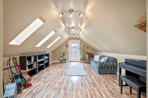 105 Lang Place, Okotoks, AB - Indoor Photo Showing Other Room