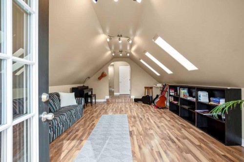 105 Lang Place, Okotoks, AB - Indoor Photo Showing Other Room