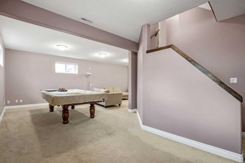 105 Lang Place, Okotoks, AB - Indoor Photo Showing Other Room
