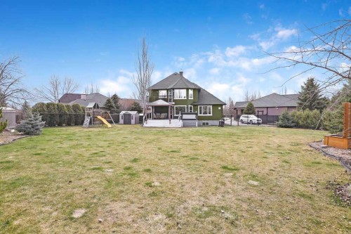 105 Lang Place, Okotoks, AB - Outdoor With Deck Patio Veranda