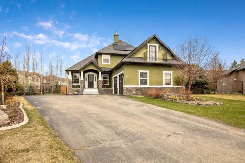 105 Lang Place, Okotoks, AB - Outdoor With Facade