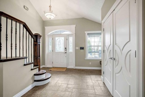 105 Lang Place, Okotoks, AB - Indoor Photo Showing Other Room