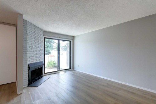 37-3015 51 Street Sw, Calgary, AB - Indoor With Fireplace