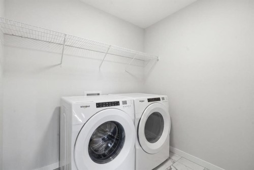 34 Belvedere Green Se, Calgary, AB - Indoor Photo Showing Laundry Room