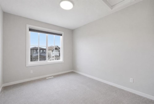 34 Belvedere Green Se, Calgary, AB - Indoor Photo Showing Other Room
