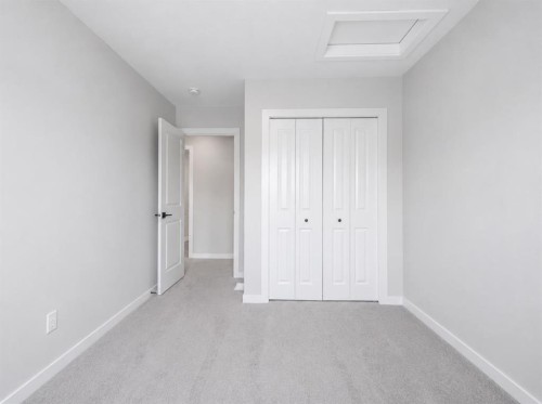 34 Belvedere Green Se, Calgary, AB - Indoor Photo Showing Other Room