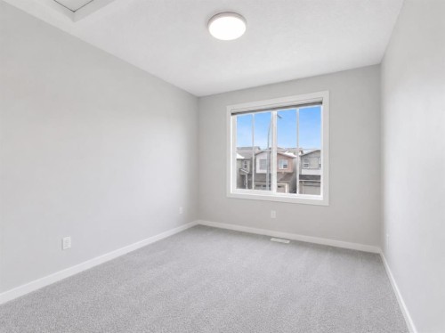 34 Belvedere Green Se, Calgary, AB - Indoor Photo Showing Other Room