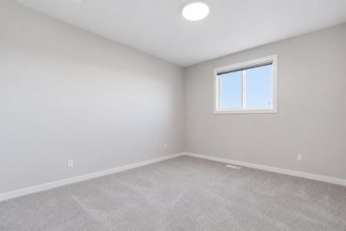 34 Belvedere Green Se, Calgary, AB - Indoor Photo Showing Other Room