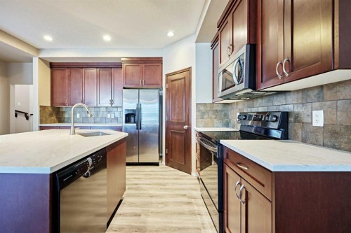 789 Panatella Boulevard Nw, Calgary, AB - Indoor Photo Showing Kitchen With Upgraded Kitchen