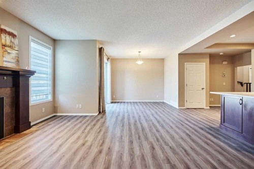 789 Panatella Boulevard Nw, Calgary, AB - Indoor With Fireplace