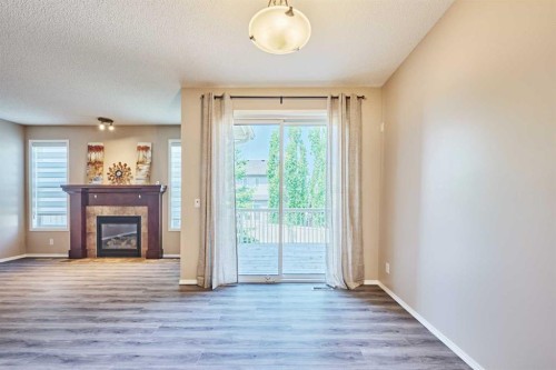 789 Panatella Boulevard Nw, Calgary, AB - Indoor With Fireplace