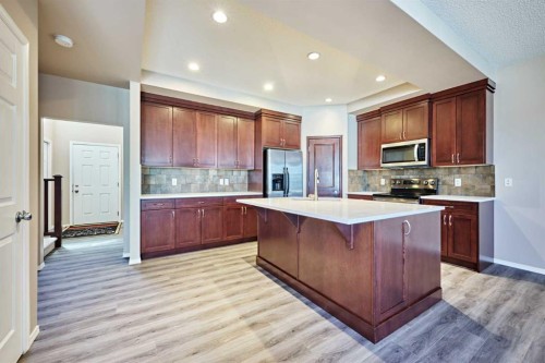 789 Panatella Boulevard Nw, Calgary, AB - Indoor Photo Showing Kitchen With Upgraded Kitchen