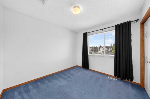 74 Anaheim Gardens Ne, Calgary, AB - Indoor Photo Showing Other Room