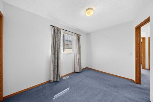 74 Anaheim Gardens Ne, Calgary, AB - Indoor Photo Showing Other Room