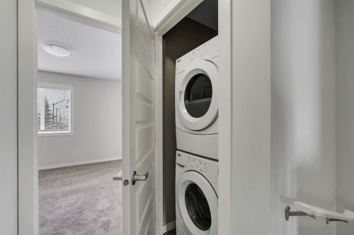 406 Mckenzie Towne Close Se, Calgary, AB - Indoor Photo Showing Laundry Room