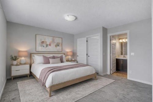 406 Mckenzie Towne Close Se, Calgary, AB - Indoor Photo Showing Bedroom