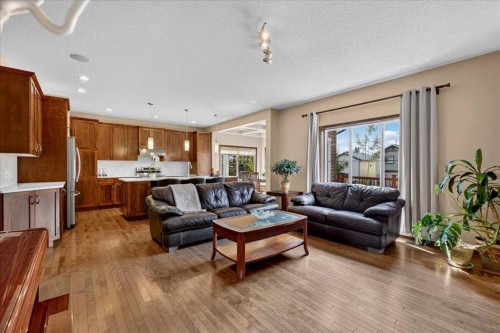 277 Evermeadow Avenue Sw, Calgary, AB - Indoor Photo Showing Living Room