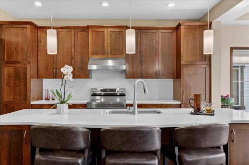 277 Evermeadow Avenue Sw, Calgary, AB - Indoor Photo Showing Kitchen With Upgraded Kitchen