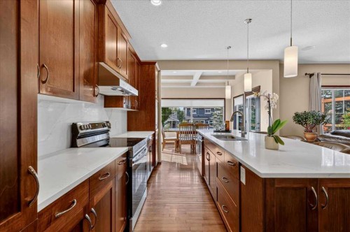 277 Evermeadow Avenue Sw, Calgary, AB - Indoor Photo Showing Kitchen With Upgraded Kitchen