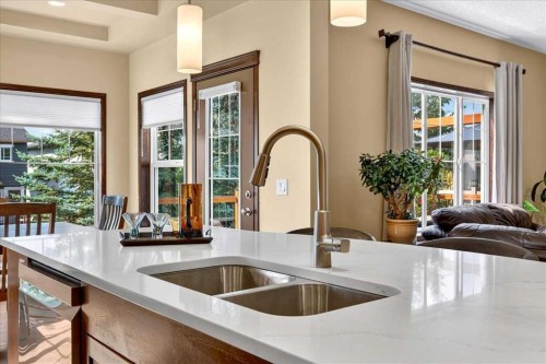 277 Evermeadow Avenue Sw, Calgary, AB - Indoor Photo Showing Kitchen With Double Sink