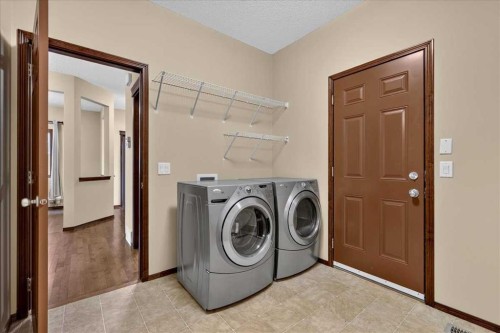277 Evermeadow Avenue Sw, Calgary, AB - Indoor Photo Showing Laundry Room