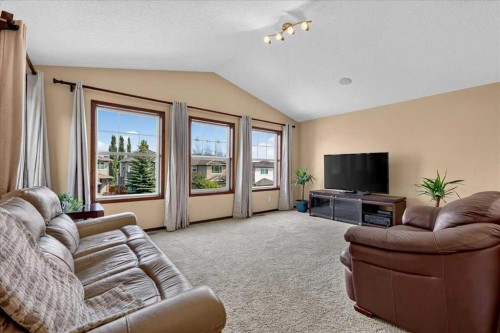 277 Evermeadow Avenue Sw, Calgary, AB - Indoor Photo Showing Living Room
