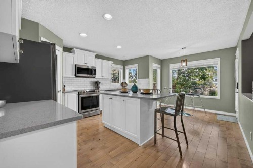 141 Douglas Glen Manor Se, Calgary, AB - Indoor Photo Showing Kitchen With Stainless Steel Kitchen With Upgraded Kitchen