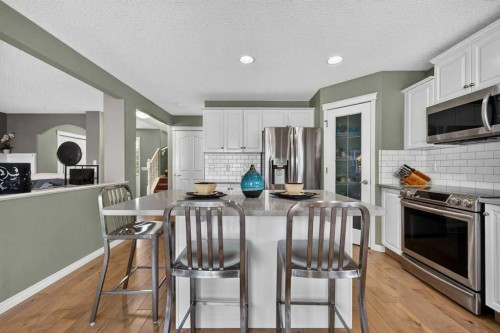 141 Douglas Glen Manor Se, Calgary, AB - Indoor Photo Showing Kitchen With Stainless Steel Kitchen With Upgraded Kitchen