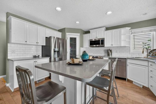 141 Douglas Glen Manor Se, Calgary, AB - Indoor Photo Showing Kitchen With Stainless Steel Kitchen With Upgraded Kitchen