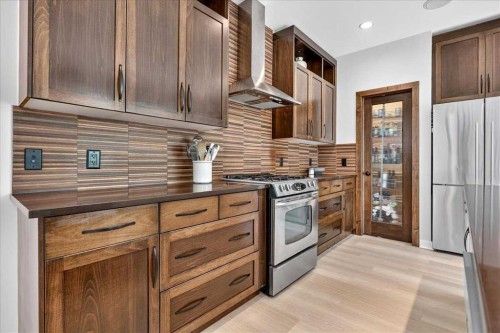 4 Quarry Landing Se, Calgary, AB - Indoor Photo Showing Kitchen With Upgraded Kitchen