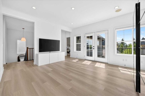 4 Quarry Landing Se, Calgary, AB - Indoor Photo Showing Living Room