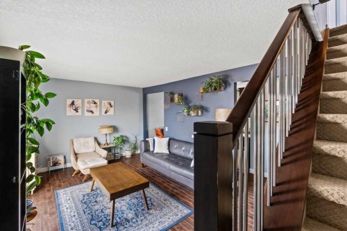 7-1603 Mcgonigal Drive Ne, Calgary, AB - Indoor Photo Showing Living Room