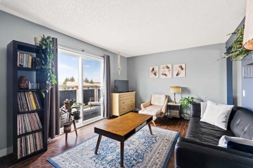 7-1603 Mcgonigal Drive Ne, Calgary, AB - Indoor Photo Showing Living Room