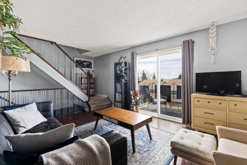 7-1603 Mcgonigal Drive Ne, Calgary, AB - Indoor Photo Showing Living Room