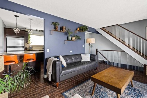 7-1603 Mcgonigal Drive Ne, Calgary, AB - Indoor Photo Showing Living Room