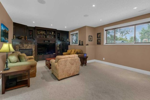 9 Tanner Close Se, Airdrie, AB - Indoor With Fireplace