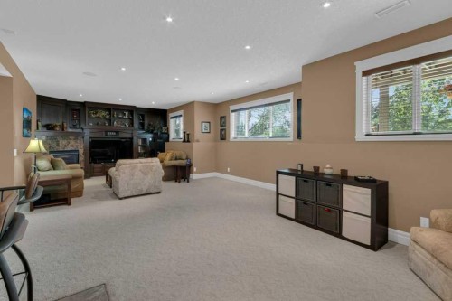 9 Tanner Close Se, Airdrie, AB - Indoor With Fireplace
