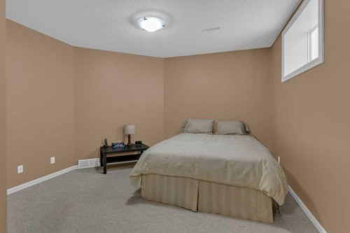 9 Tanner Close Se, Airdrie, AB - Indoor Photo Showing Bedroom
