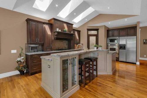 9 Tanner Close Se, Airdrie, AB - Indoor Photo Showing Kitchen With Upgraded Kitchen