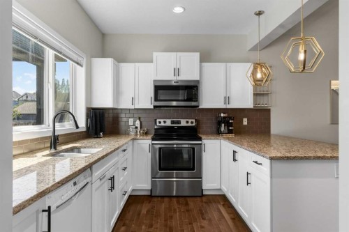 213 Mahogany Heights Se, Calgary, AB - Indoor Photo Showing Kitchen With Double Sink With Upgraded Kitchen