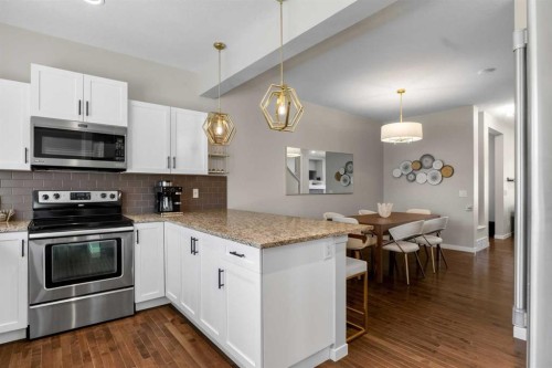 213 Mahogany Heights Se, Calgary, AB - Indoor Photo Showing Kitchen With Upgraded Kitchen